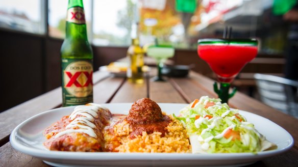Cisco's platter includes a burrito, enchilda and spicy meatball.