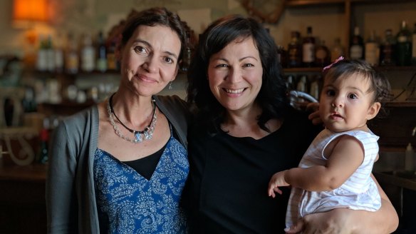Cookbook authors Tessa Kiros (left) and Emiko Davies with her daughter Luna.