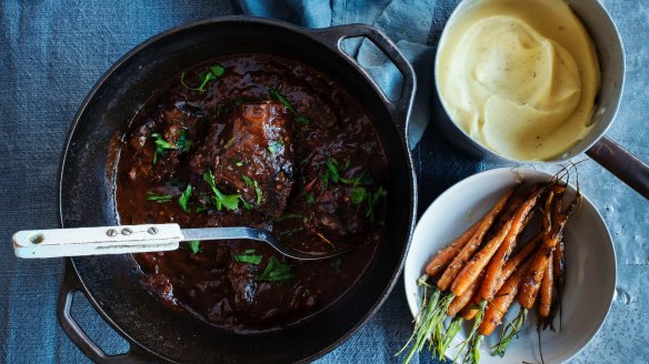 Braised beef cheeks with carrots and parsnip puree.
