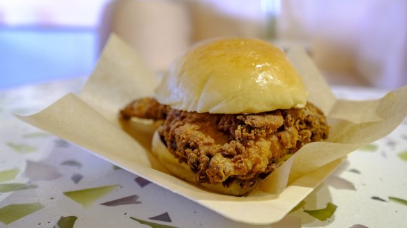 The fried chicken sandwich is discounted during happy hours.