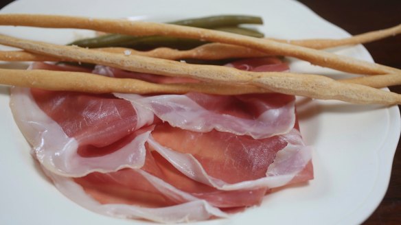 Go-to dish: Prosciutto di Parma with pickled green beans and hand-rolled grissini.