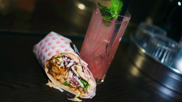 Biggie Smalls' off-menu special, the ODB, filled with pork and prawn siu mai, hoisin mayo, pickled ginger slaw and chilli jam (pictured with gin 'n' juice).