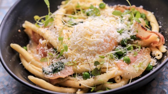 Breakfast pasta with slow-cooked egg, pecorino and guanciale.