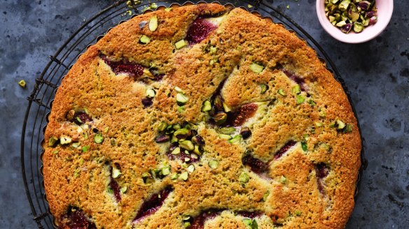 Bakewell tart dotted with pistachios and fresh fig wedges.