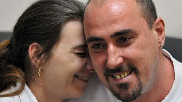 In this March 25, 2008 Serge Atlaoui (right), Frenchman on death row, is seen with wife Sabine Atlaoui (left) during a visit at Nusakambangan prison island. 