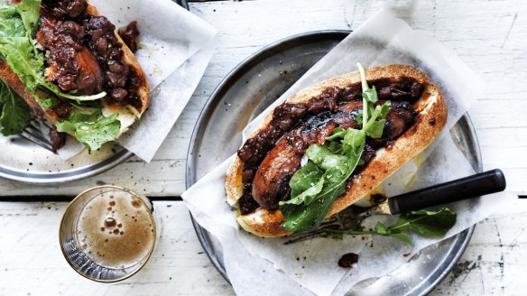 The secret is to cook the snag in sauce: Adam Liaw's perfect barbecued sausage in a bun.