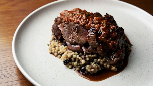 Lamb rump, harissa, currant and cracked seed maftool.