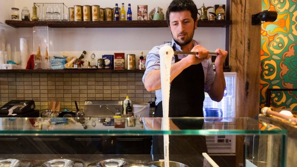 Harun Yalcin stretching Turkish ice-cream at Cuppa Turca in Northcote.