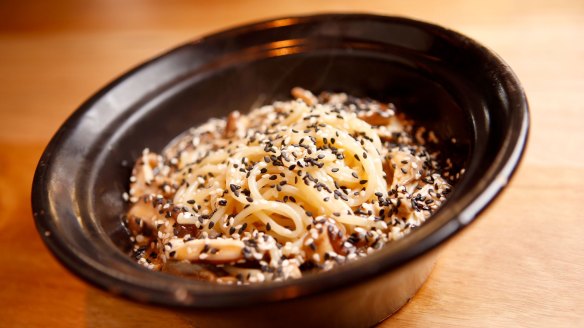 Slurpably spectacular: Mushroom noodles with chilli oil.
