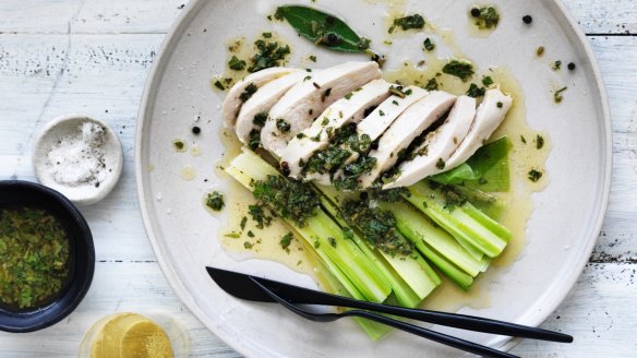 Champagne-poached chicken and leeks with summer herb butter.