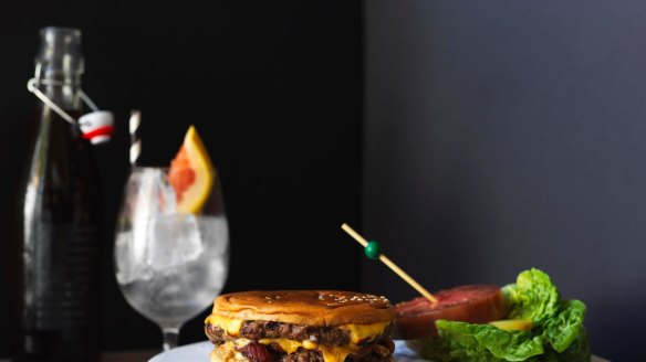 Bondi Beach Public Bar's squish burger with double beef, cheese, bacon and onion.
