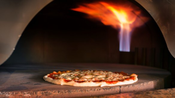 The pizza oven is the biggest in Canberra, fitting up to 14 pizzas.