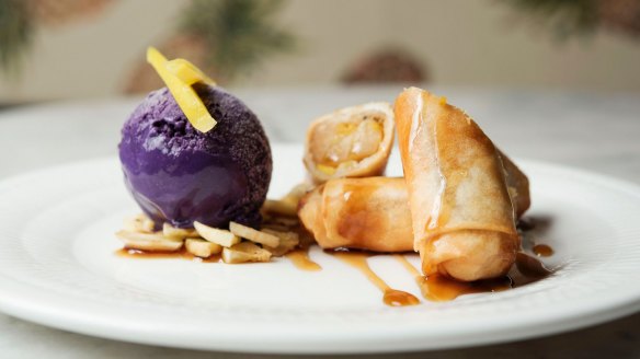 A dessert of turon with ube (purple yam) parfait.