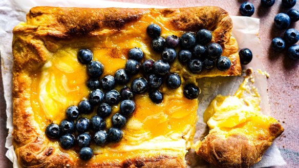 A fluffy, buttery pillow slathered with lemon curd and ricotta and scattered with berries.