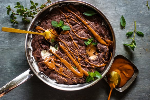 Giant triple chocolate cookie drizzled with hot fudge sauce.