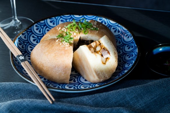 The giant pork bun, stuffed with a chunky mix of belly pork, chestnuts and mustard greens.