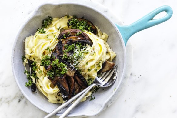 Creamy fettucine alfredo with garlic mushrooms.