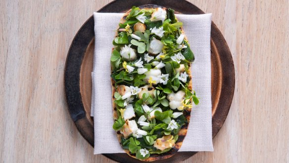 Grilled flatbread, wild garlic paste, barbecued lobster and greens.