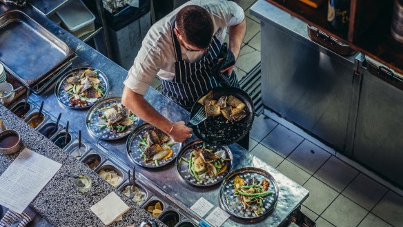 Inside the kitchen at the Ottolenghi-approved 
 Machneyuda restaurant in Jerusalem.