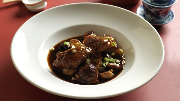 Braised duck leg with chestnuts.