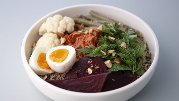 Quinoa with house pickles, yoghurt and soft-boiled egg. 