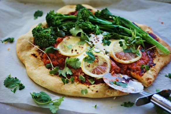 Spicy harissa, broccolini and lemon pizza with cooling whipped feta.