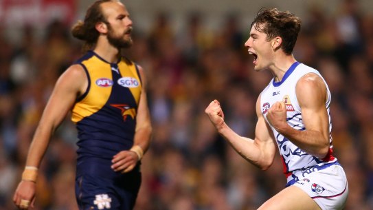 Josh Dunkley celebrates a goal.