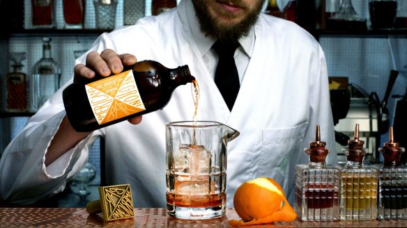 Matt Bax prepares a Bar Americano pre-batched negroni.