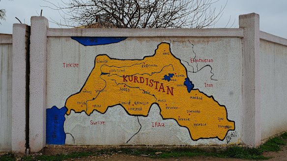 Map of Kurdistan hand-painted on a wall in the main city of Qamishli, in Rojava, north-eastern Syria. 