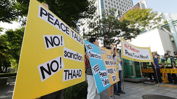 South Korean protesters stage a rally denouncing the United States and South Korean government's policy against North Korea in Seoul.