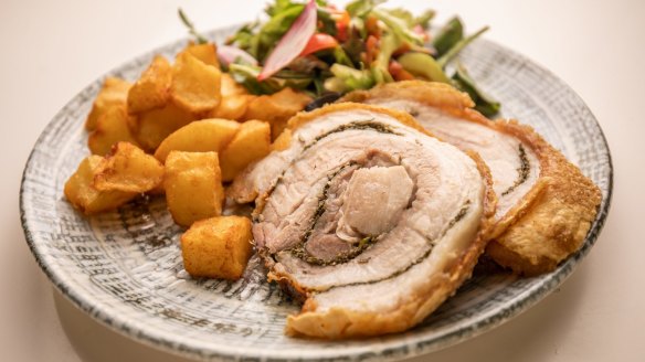 Porchetta plate with potatoes.