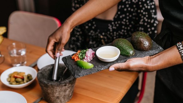 Smashed avo: Mejico's guacamole is prepared at the table.