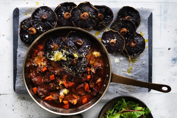 Braised lamb shoulder with thyme roasted mushrooms. 