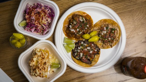 Tacos and sides at Tacos y Liquor.