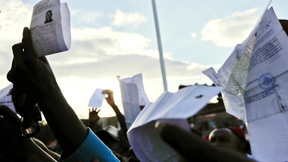 Haitian migrants queue at the US-Mexico border hoping to to gain a spot on the daily list to cross to the US.