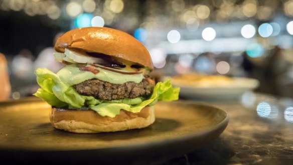 Grilled lamb burger, haloumi, mint and pickled red onion.