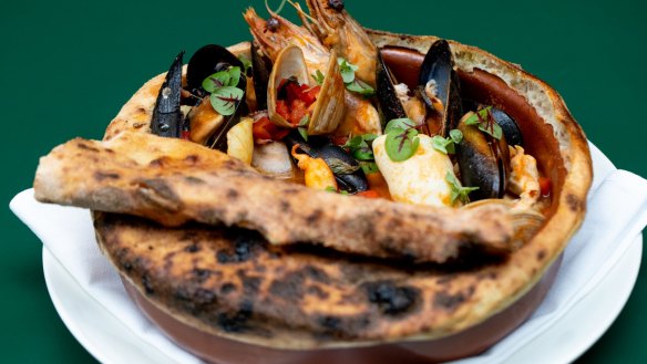 Brodetto di pesce (pastry-topped seafood stew). 