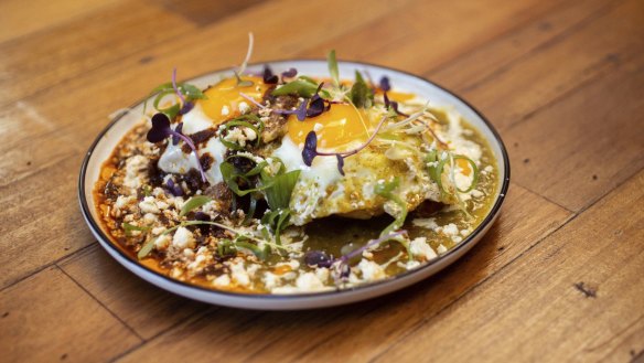 Divorciados eggs tlacoyos (divorce eggs on bean-filled flatbread).