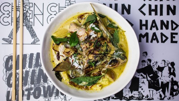 Go-to dish: Green curry with grilled fish wing, pea eggplant and baby corn.