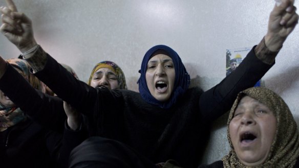 Mourners at the funeral of 21-year-old Palestinian Ramzi al-Kasrawi.