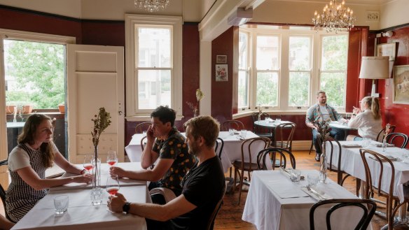 White linen now dresses the tables in the upstairs dining room.