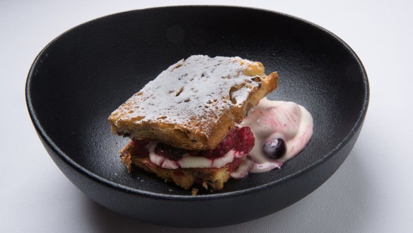 Panettone sandwiched with ice-cream and berries.