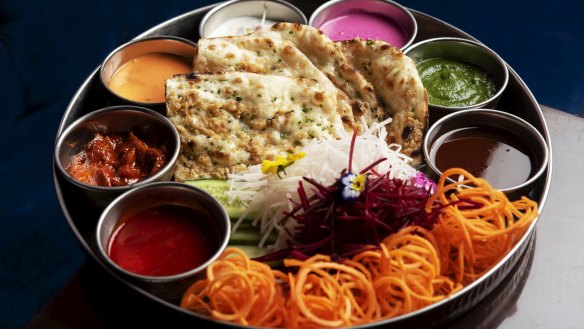 Pappadum and naan platter served with zippy chutneys.