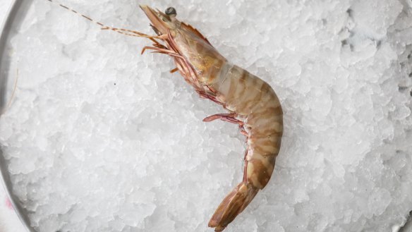 Buy tiger prawns raw and cook in their shell.
