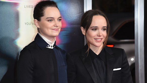 Ellen Page and Emma Portner, left, arrive at the world premiere of "Flatliners" in Los Angeles.