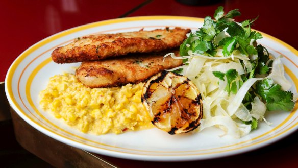 Parmesan-crumbed chicken schnitzel, creamed corn and fennel.