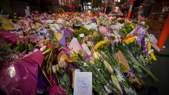 Floral tributes line Bourke Street Mall.