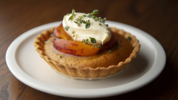 Almond and macadamia tart with peaches. 