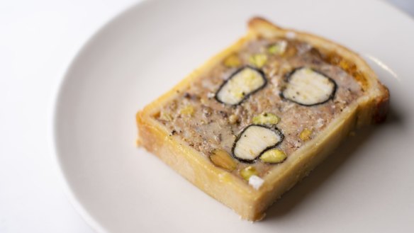 A traditional pâté en croute made with non-traditional farce of coral trout.