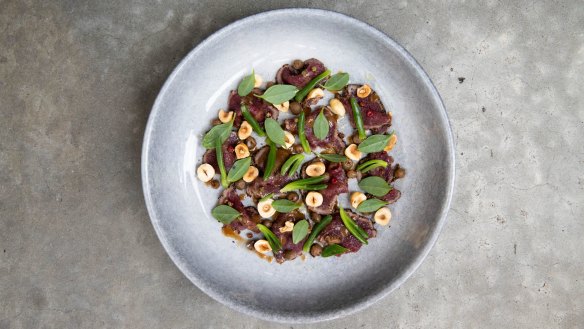 Cured kangaroo with wattleseed, muntries, karkalla and hazelnuts.